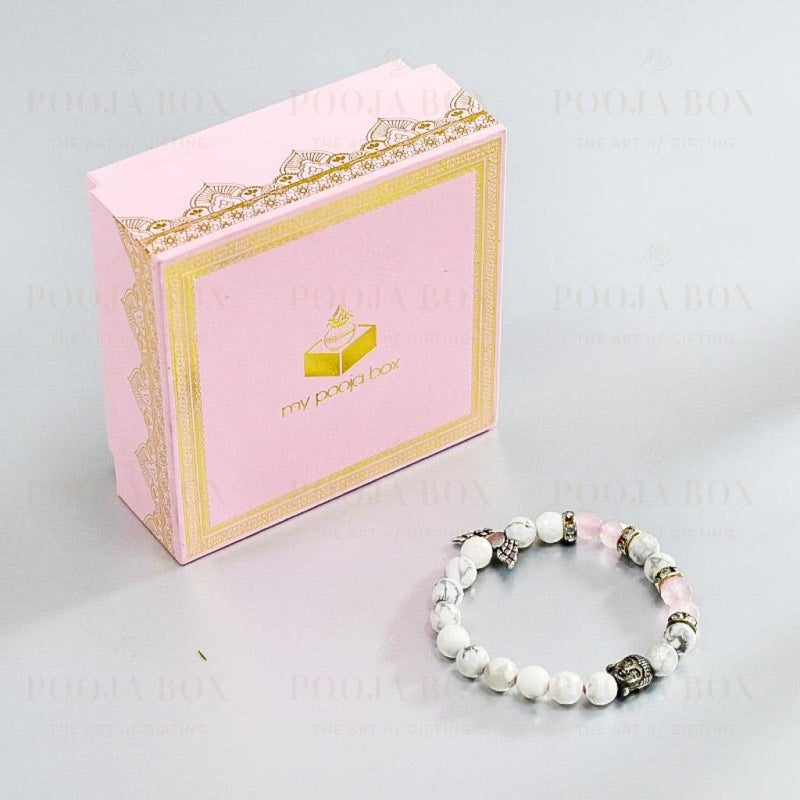 Howlite & Rose Quartz Bracelet with Buddha and Angel Wings